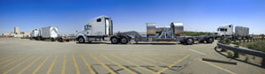 On June 7, 2012, Waste Isolation Pilot Plant (WIPP) trucks approach the WIPP facility near Carlsbad, New Mexico, with the first shipment of defense-related remote-handled transuranic (TRU) waste from Savannah River Site (SRS), near Aiken, South Carolina.  TRU waste consists of materials contaminated with radioactive elements that have atomic numbers greater than uranium, including tools, rags, protective clothing, sludge and soil. That shipment and two contact-handled TRU waste shipments were released by SRS at the same time The three shipments consisted of (left to right) a TRUPACT-III, a RH-72B and one with TRUPACT-IIs,  -- marking another first for WIPP. Since opening in 1999, WIPP has established an impressive record. In addition to more than 10,500 safe shipments, WIPP drivers have logged more than 12.6 million safe loaded miles—equivalent to 26 roundtrips to the moon without a serious accident or injury–to clean up 22 TRU waste sites around the nation.